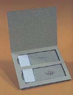 Two slides in cardboard holder
